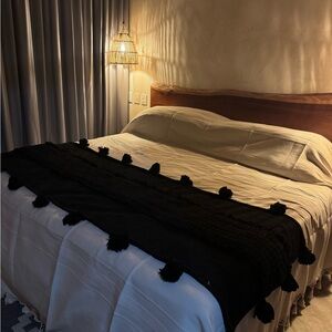 Handmade black bed runner from Mexico.